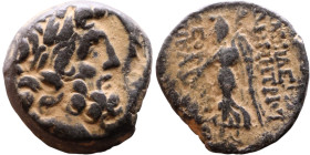 Syria: Apameia ad Orontem Semi-autonomous issue. (I Century) Bronze coin. Obv: Diademed head of Zeus right  Rev: Nike walking left, holding wreath and...