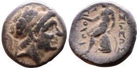Antiochus I Soter (Seleukid King: 281-261 BC). AE bronze. Obv.: Diademed head of King Rev: Apollo seated left on omphalos, testing arrow and resting l...
