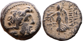 Syria: Apameia ad Orontem Semi-autonomous issue. (I Century) Bronze coin. Obv: Diademed head of Zeus right  Rev: Nike walking left, holding wreath and...