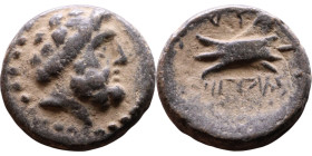 Phoenicia Arados (II Century BC) Bronze coin. Obverse: Diademed head of Poseidon right Reverse: Stern or ram of galley, unclear date below.