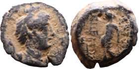 Alexander II Zabinas (Seleukid King: 128 BC-123 BC) Bronze Obv: Diademed head of King Rev: Apollo standing left, testing arrow 