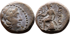 Antiochus I Soter (Seleukid King: 281-261 BC). AE bronze. Obv.: Head of Apollo Rev: Apollo seated left on omphalos, testing arrow and resting left han...