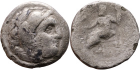Alexander III (336-323 BC) Silver coin Obverse: Head of Herakles to right, wearing lion skin headdress Rev: Zeus seated left on low throne, holding lo...
