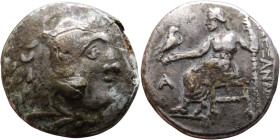 Alexander III (336-323 BC) Silver coin Obverse: Head of Herakles to right, wearing lion skin headdress Rev: Zeus seated left on low throne, holding lo...