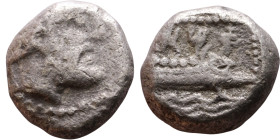 Phoenicia, Arados. Uncertain king. Circa 380-351 Silver coin. Obv: Bust of king. Rev: Galley