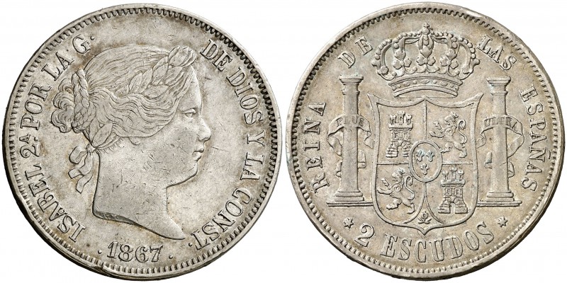 1867. Isabel II. Madrid. 2 escudos. (Cal. 204). 25,89 g Golpecitos. MBC/MBC+.