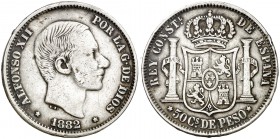 1882. Alfonso XII. Manila. 50 centavos. (Cal. 82). 12,86 g. MBC-.