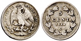 1864. México. Maximiliano. Guanajuato. 5 centavos. (Kr. 385). 1,34 g. AG. Rara. MBC-/MBC.