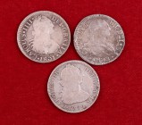 Carlos III y Carlos IV. Lima, México y Sevilla. 2 reales. Lote de 3 monedas, una con intento de perforación y otra que sirvió como joya. BC/BC+.