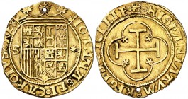 s/d. Juana y Carlos. Sevilla. 1 escudo. (Cal. 57). 3,21 g. Perforación. Ex Colección Manuela Etcheverría. (MBC+).