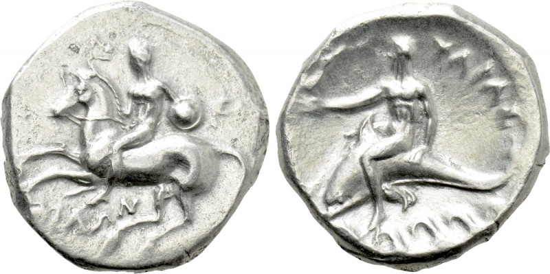 CALABRIA. Tarentum. Nomos (Circa 302-280 BC). 

Obv: Youth, holding shield, on...