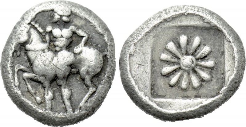 IONIA. Erythrai. Obol(?) (Circa 480-450 BC). 

Obv: Nude male standing left, h...