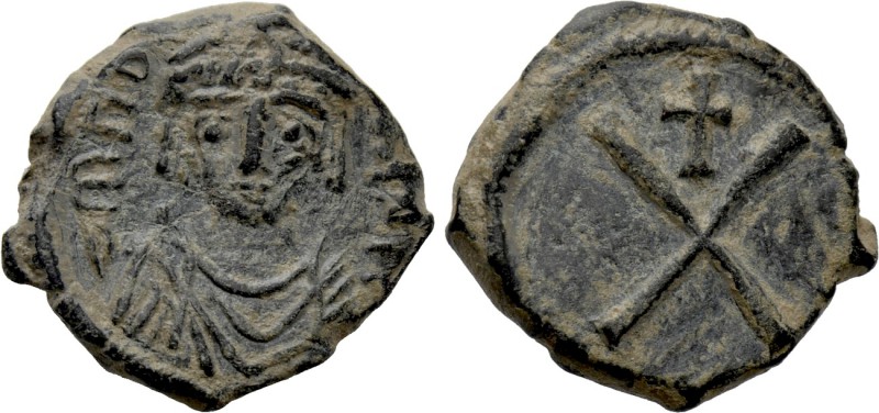 TIBERIUS II CONSTANTINE (578-582). Decanummium. Constantinople. 

Obv: Crowned...