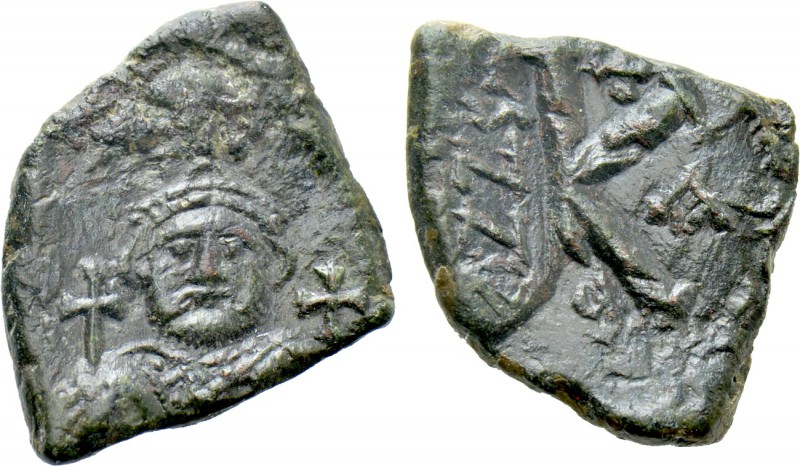 LEONTIUS (695-698). Half Follis. Constantinople. Dated RY 1 (695/6). 

Obv: Cr...