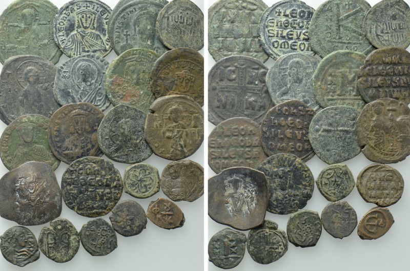 21 Byzantine and Islamic Coins. 

Obv: .
Rev: .

. 

Condition: See pictu...