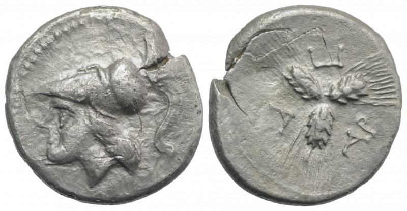 Northern Apulia, Arpi, c. 215-212 BC. AR Triobol (15mm, 1.80g). Helmeted head of...