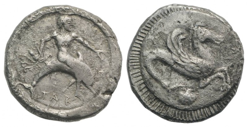 Southern Apulia, Tarentum, c. 500-480 BC. AR Nomos (19mm, 7.87g, 8h). Taras ridi...