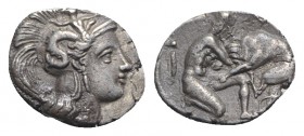 Southern Apulia, Tarentum, c. 380-325 BC. AR Diobol (11mm, 1.28g, 6h). Head of Athena r., wearing Attic helmet decorated with Skylla, holding a rock i...