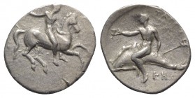 Southern Apulia, Tarentum, c. 320-315 BC. AR Nomos (20mm, 7.70g, 5h). Rider on horse galloping r., using whip; ΣΑ below. R/ Dolphin rider l., holding ...