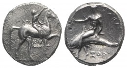 Southern Apulia, Tarentum, c. 320-280 BC. AR Nomos (21mm, 7.74g, 11h). Youth on horseback r., crowning horse; AΓΩ to l., KPAT/INOΣ below. R/ Phalantho...