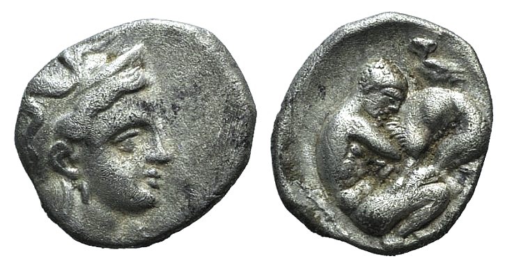 Southern Apulia, Tarentum, c. 325-280 BC. AR Diobol (11mm, 1.16g, 9h). Helmeted ...