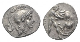 Southern Apulia, Tarentum, c. 325-280 BC. AR Diobol (11mm, 0.97g, 9h). Helmeted head of Athena r., helmet decorated with three circles; I on neck-guar...