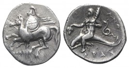 Southern Apulia, Tarentum, c. 280-272 BC. AR Nomos (21mm, 6.44g, 2h). Horseman l., holding shield and two spears; ZΩ to r. R/ Phalanthos riding dolphi...