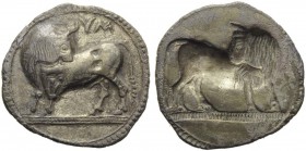 Southern Lucania, Sybaris, c. 550-510 BC. AR Stater (27mm, 7.36g, 12h). Bull standing l., looking backwards; above, MV (retrograde). R/ Same type incu...