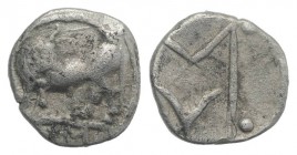 Southern Lucania, Sybaris, c. 550-510 BC. AR Obol (8mm, 0.44g, 3h). Bull standing l., head r.; VM in exergue. R/ Large MV monogram; pellets at corners...