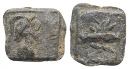 Roman PB Tessera, c. 1st century BC - 1st century AD (15mm, 3.55g, 3h). Helmeted bust of Minerva(?) r. R/ Uncertain (phallus?). VF