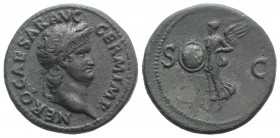Nero (54-68). Æ As (27mm, 9.73g, 6h). Rome, c. AD 65. Laureate head r. R/ Victory flying l., holding shield inscribed S P Q R. RIC I 312. VF