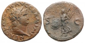 Nero (54-68). Æ As (26mm, 9.29g, 6h). Rome, c. AD 65. Laureate head r. R/ Victory flying l., holding shield inscribed S P Q R. RIC I 312. Brown patina...
