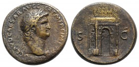 Nero (54-68). Æ Sestertius (34mm, 30.79g, 6h). Lugdunum, c. AD 65. Laureate head r., small globe at point of neck. R/ Triumphal arch surmounted by att...