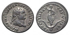 Titus (79-81). AR Denarius (18mm, 2.07g, 6h). Rome, AD 80. Laureate head r. R/ Dolphin coiled around anchor. RIC II 112; RSC 309. Toned, VF
