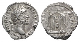 Antoninus Pius (138-161). AR Denarius (17mm, 3.16g, 12h). Rome, AD 159. Laureate head r. R/ Octastyle temple within which are seated the figures of Di...