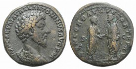 Marcus Aurelius (161-180). Æ Sestertius (32mm, 24.05g, 12h). Rome, AD 162. Bareheaded and cuirassed bust r. R/ Marcus Aurelius standing r., holding vo...