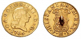 Carlos III (1759-1788). 1/2 escudo. 1765. Madrid. PJ. (Cal-759). Au. 1,86 g. Con argolla soladada en reverso. MBC-. Est...75,00.
