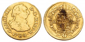Carlos III (1759-1788). 1/2 escudo. 1784. Madrid. JD. (Cal-776). Au. 1,72 g. Restos de soldadura en reverso. BC+. Est...85,00.
