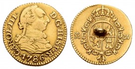 Carlos III (1759-1788). 1/2 escudo. 1786. Madrid. DV. (Cal-778). Au. 1,78 g. Argolla en reverso. BC+. Est...80,00.