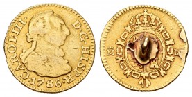 Carlos III (1759-1788). 1/2 escudo. 1786. Madrid. DV. (Cal-778). Au. 1,84 g. Argolla en reverso. BC. Est...80,00.