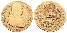 Carlos IV (1788-1808). 1 escudo. 1791. Madrid. MF. (Cal-490). Au. 2,58 g. Sirvió como joya. Soldadura en reverso. BC-. Est...65,00.