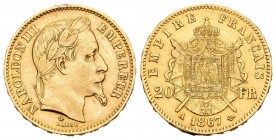 Francia. Napoleón III. 20 francos. 1867. París. A. (Km-801.1). (Fr-584). Au. 6,43 g.  Restos de soldadura en el canto. MBC-. Est...180,00.