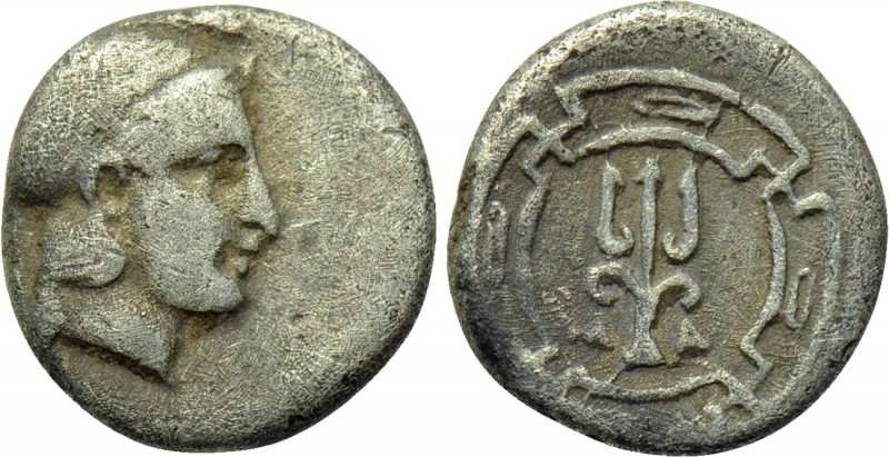 IONIA. Magnesia ad Maeandrum. Trihemiobol (Circa 400-350 BC). 

Obv: Helmeted ...