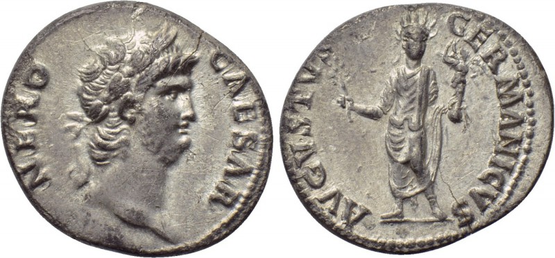 NERO (54-68). Denarius. Rome.

Obv: NERO CAESAR.
Laureate head right.
Rev: A...