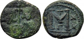JUSTINIAN II with TIBERIUS (705-711). Follis. Constantinople.