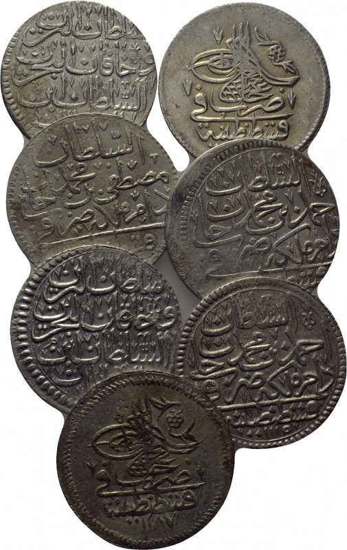 7 Ottoman coins. 

Obv: .
Rev: .

. 

Condition: See picture.

Weight: ...
