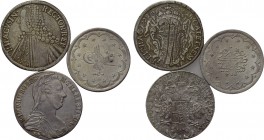 3 modern silver coins.