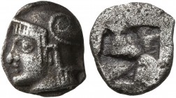 GAUL. Massalia. Circa 475-460 BC. Obol (Silver, 9 mm, 0.80 g). Head of Athena to left, wearing Attic helmet adorned with a volute on the bowl. Rev. Ro...