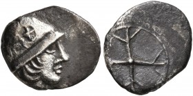 GAUL. Massalia. Circa 450-410 BC. Obol (Silver, 11 mm, 0.79 g). Male head with long hair to right, wearing helmet adorned with wheel of four spokes on...