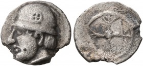 GAUL. Massalia. Circa 450-410 BC. Obol (Silver, 10 mm, 0.61 g). Male head with long hair to left, wearing helmet adorned with wheel of four spokes on ...